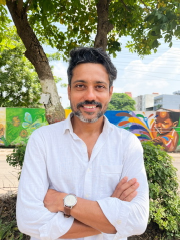 Pushpendra Agrawal outdoors in a white shirt